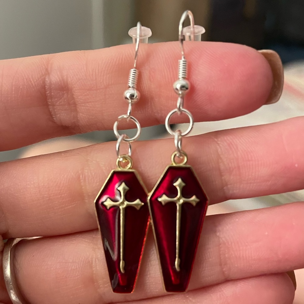 Cross/coffin dangle earrings.